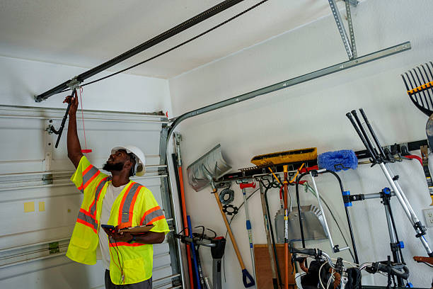Professional Garage Door Installation technician working in Clarksville, IA